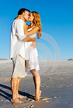 Beach couple kiss