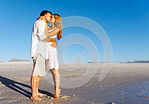 Beach couple kiss