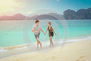 Beach couple lover walking on the beach honeymoon vacation summer holidays romance