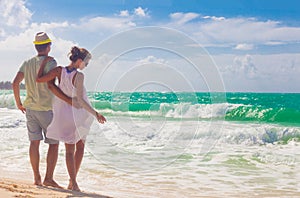 Beach couple walking on romantic travel honeymoon vacation summer holidays romance. Young happy lovers, Cayo LArgo, Cuba