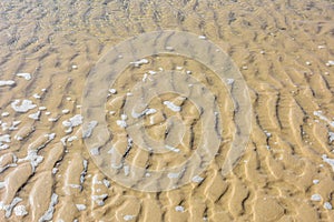 Beach, crest sand under water