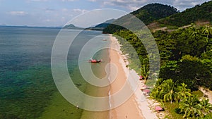 Beach with crystal clear water and blue sky at Koh Libong, Trang province, Thailand, Andaman Sea.