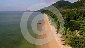 Beach with crystal clear water and blue sky at Koh Libong, Trang province, Thailand, Andaman Sea.