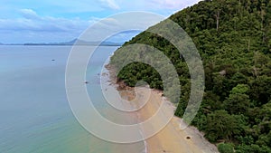 Beach with crystal clear water and blue sky at Koh Libong, Trang province, Thailand, Andaman Sea.