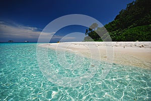 Beach with crystalic water and white sand