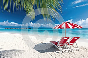 Beach deck chair with red umbrella on tropical sand beach in sunny sky background