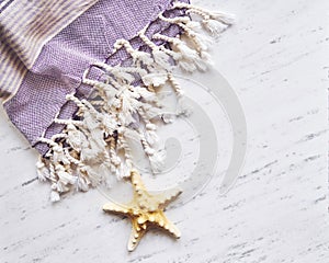 Beach essentials on white marble.