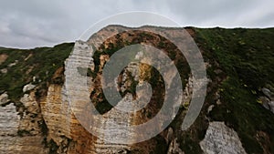 Beach filled with pebles, Cliffs of Normandy.