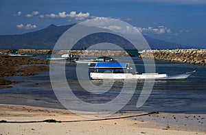 Beach with fishing boat in Asia.