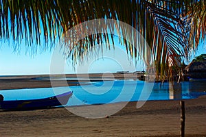 Beach of a fishing village, Low tide at sunset.