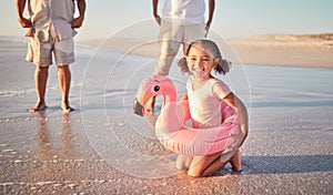 Beach, flamingo and child portrait on family holiday in Mexico enjoying summer break. Young, happy and excited girl