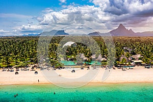 Beach of Flic en Flac with beautiful peaks in the background, Mauritius. Beautiful Mauritius Island with gorgeous beach Flic en photo