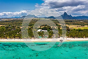 Beach of Flic en Flac with beautiful peaks in the background, Mauritius. Beautiful Mauritius Island with gorgeous beach Flic en photo