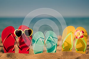 Beach flip-flops on the sand