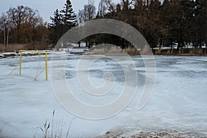 Frozen beach soccer field during winter