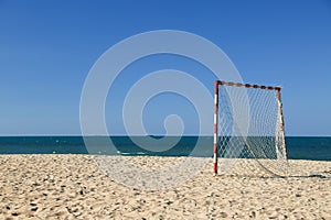 Beach football pitch on a sunny day, popular sport on the beach