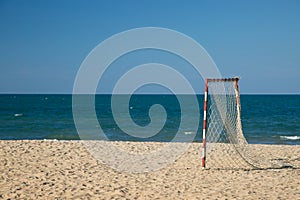 Beach football pitch on a sunny day, popular sport on the beach