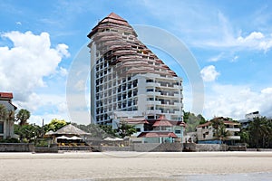 Beach Front Condominium with Blue Sky Background