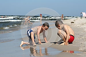Beach fun - drawing on beach