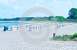 Beach on the German Baltic Sea with beach chair and holiday feeling with sand