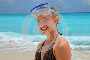 Beach girl with snorkel mask