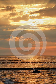 Beach with groynes in front of Kuehlungsborn in the wonderful evening light