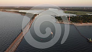 The beach on GÃ³rki Zachodnie in GdaÅ„sk and the estuary of the Vistula.