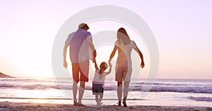 Beach, hands and family at the ocean at sunset, swinging, happy and having fun on vacation against sky background. Happy