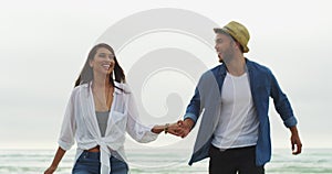 Beach, happy and couple holding hands, walking and running on tropical journey, freedom and outdoor trip. Nature, waves