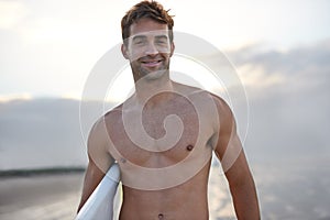 Beach, happy and portrait of man with surfboard for waves on summer vacation, weekend and holiday by sea. Surfing