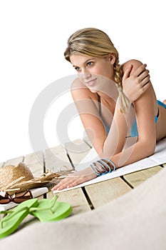 Beach - Happy woman relax on wooden plank