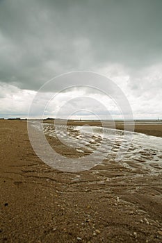 Beach of Houlgate in Normandy with cloudy sky 2