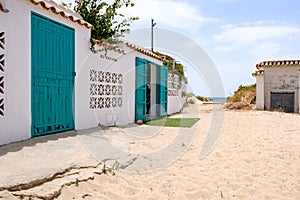 Beach house with green painted entrance door