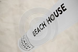 Beach house printed on a post in an indoor beach sports hall