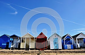 Beach houses under blue sky