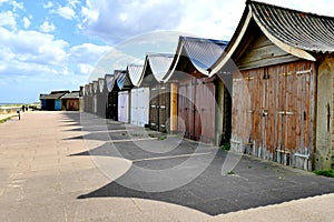 Beach hut shadows.