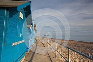 Beach huts along side Cromer beach.