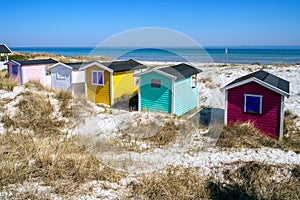 Beach huts or bath cottages on Skanor beach dunes and Falsterbo in South Sweden, Skane travel destination. Domestic tourism