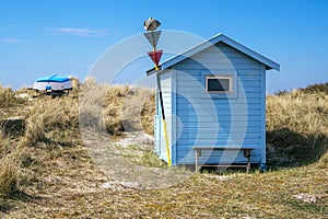 Beach huts or bath cottages on Skanor beach dunes and Falsterbo in South Sweden, Skane travel destination. Domestic tourism