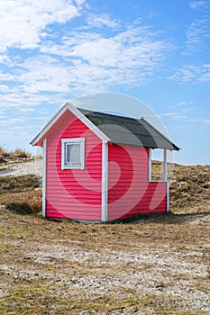 Beach huts or bath cottages on Skanor beach dunes and Falsterbo in South Sweden, Skane travel destination. Domestic tourism