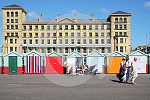 Beach huts and buildings on Brighton promenade