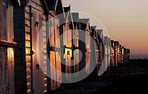 Beach huts at dawn