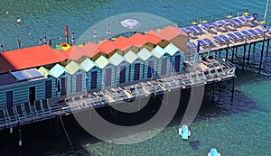 Beach huts on a jetty in Sorrento Italy