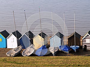 Beach huts and sailing Boats photo