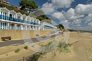 Beach huts on seafront at Bournemouth, Dorset