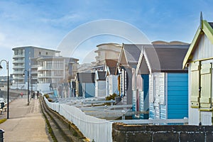 Beach huts in a seaside town with a sea view