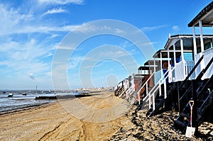 Beach huts on Southend beach, Essex, at low tide photo