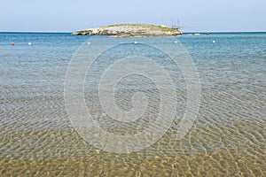 Beach and island on the coast of Torre Canne