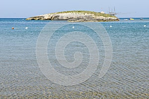 Beach and island on the coast of Torre Canne