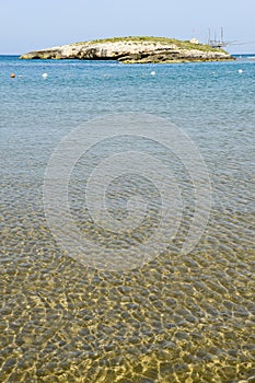 Beach and island on the coast of Torre Canne